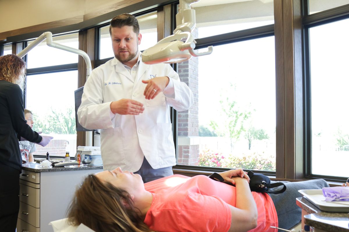 Dr. Dillehay talking to a patient 