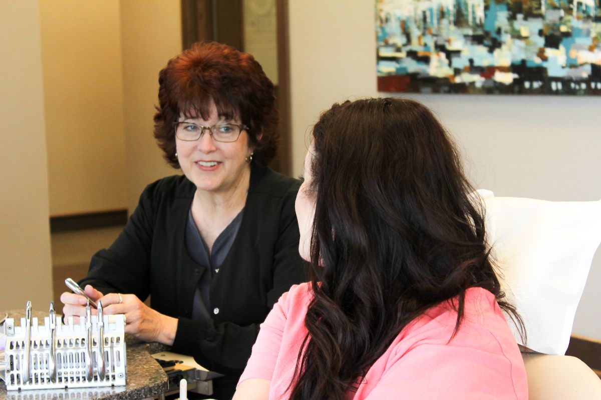 Dillehay assistant talking to patient
